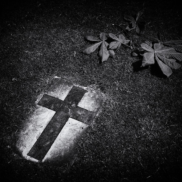A cross in the grass