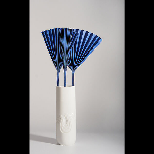 A vase of flowers (a sheet of paper photographed three times)