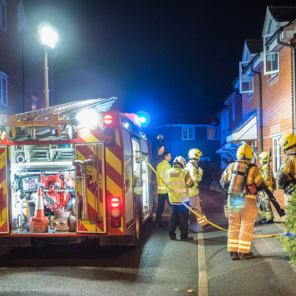 Attending a kitchen fire a few doors away