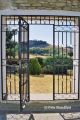 View through an open gate, Cortijo Las Piletas, Ronda, Spain