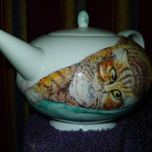 Influenced by my cats. Your Dog, Cat or any combination of animals on a Teapot. Both sides can be Hand Painted. Prices start. Commission Price: £80