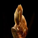 stone carving of golden flames