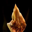 stone carving of golden flames in alabaster