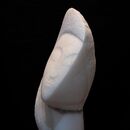 abstract stone carving of a female head