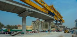 Launching Gantry on its way to Healthcare City Station in the distance