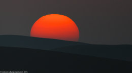 Desert Sunrise over the sand dunes Khatim Desert