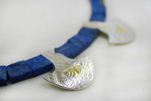 Rough lapis lazuli with silver and 18ct gold.