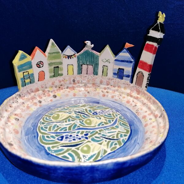 05-Scrafitto in the sea beach huts lighthouse - commissioned