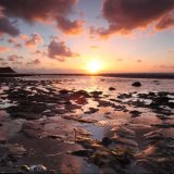 ballaugh beach sunset clouds