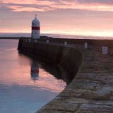 Sunrise over Castletown Breakwater
