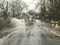 Lloyd Pickup--- Driving through a puddle.