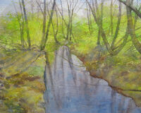 Greening spring light through trees just greening