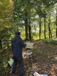 artist sketching sweet chestnuts in watercolour