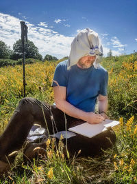 Drawing amid Dyer's greenweed, Birches Farm artist drawing meadow