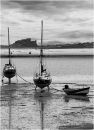 Boats and Bamburgh Castle