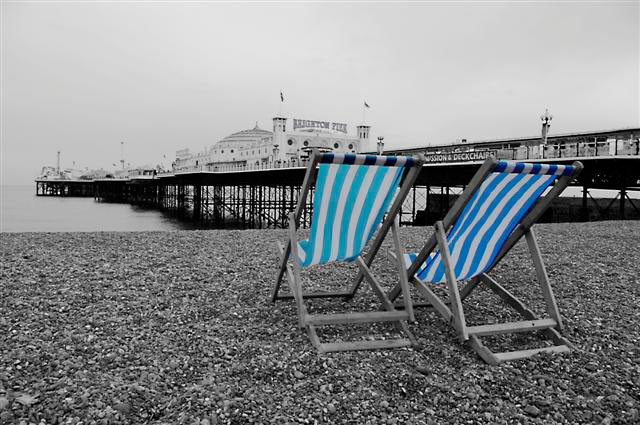 Blue Deckchairs by Brighton Pier