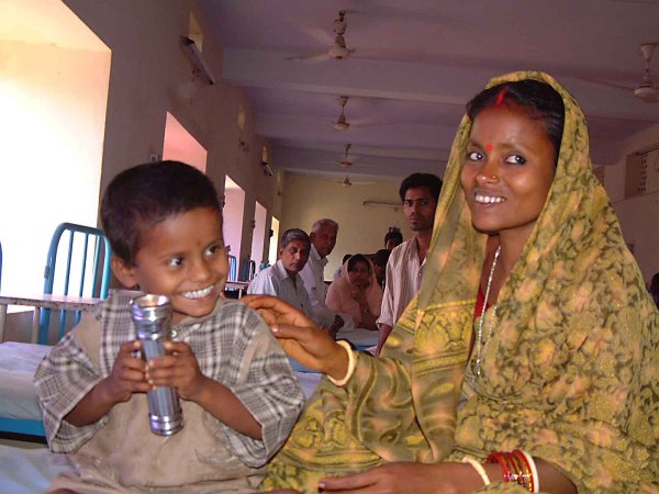 Mother & son waiting in a Sight Savers eye camp