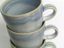 Tall flare mugs (detail).