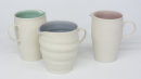 Thrown porcelain with complementary glaze colours