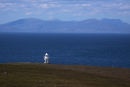 Waternish Lighthouse with Harris in distance