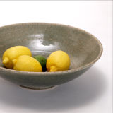 Large fruit bowl with olive green speckle glaze