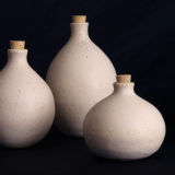 Bottles and squat vase