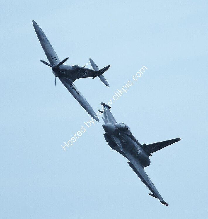BAE Typhoon FGR4 Ow-RAF ZK349 (BS110-399) & Supermarine Spitfire IIA Ow-RAF P7350 Fly Together At The RAF Fairford Airshow Gloucestershire UK 2019 Order Number FT&S-37