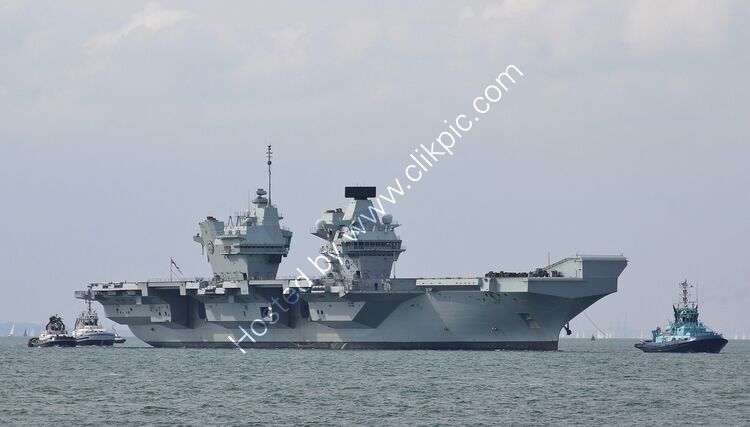 HMS PRINCE OF WALES-(RO9) BRITISH ROYAL  NAVY Having  broken  down in  the Solent off of  the IOW was+ being towed into  RN Dockyard  Portsmouth  Hampshire UK  2015  Order Number RNGB(ACC)-114