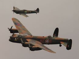Ref-BMF-30 Avro Lancaster1 PA474 & S-SpitfireXVI TE311 Both RAF-BBMF Bournemouth Hants Gt Britain 2014 (C)RLT Aviation And Maritime Images 2014 opt