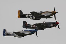 Ref-P51-74 Three Privately Owned Preserved NA P51 Mustangs In Formation At Duxford Aerodrome Cambridgeshire Gt Britain 2016 (C)RLT Aviation And Maritime Images 2018 opt