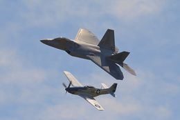 Ref GMJ-45 Lockheed Martin F22 Raptor USAF 09-191 and NA P51D Mustang USAAF Private Owner 44-72216 G-BIXL Duxford Aerodrome Gt Britain 2016 (C)RLT Aviation And Maritime Images 2018 opt