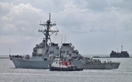 USS ROSS United States Navy Arleigh Burke CLASS Destroyer DDG71 & Serco Marine Tug SD FORCEFULPlymouth Sound Plymouth Devon UK 2021 Order No-USS(D)-9