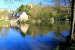 Millpond, reflections, at water mill, St Cénéri