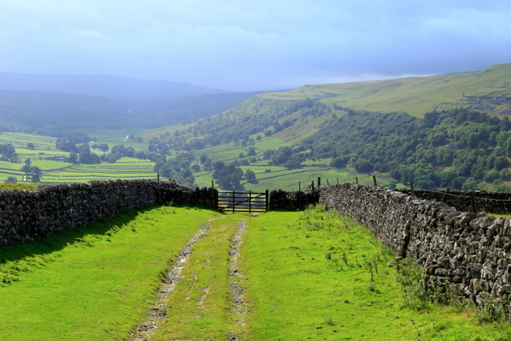 Looking down to Kettlewell from Top Mere Road, with storm approaching