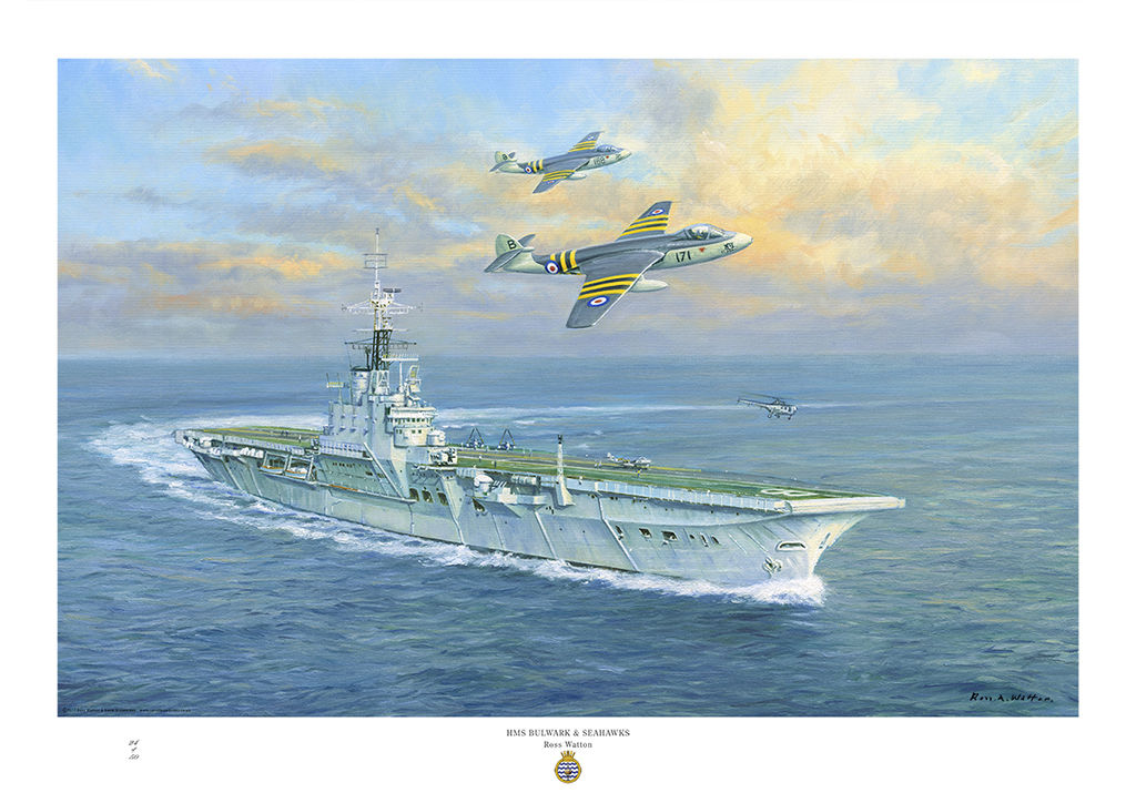 HMS Bulwark turning to port with two Seahawk aircraft flying overhead