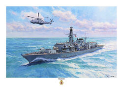 HMS Somerset (F82) sailing at high speed, with Merlin Mk2 overhead