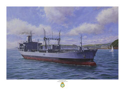 RFA Brambleleaf passing Picklecombe Fort in Cornwall with clouds against a bright blue sky.