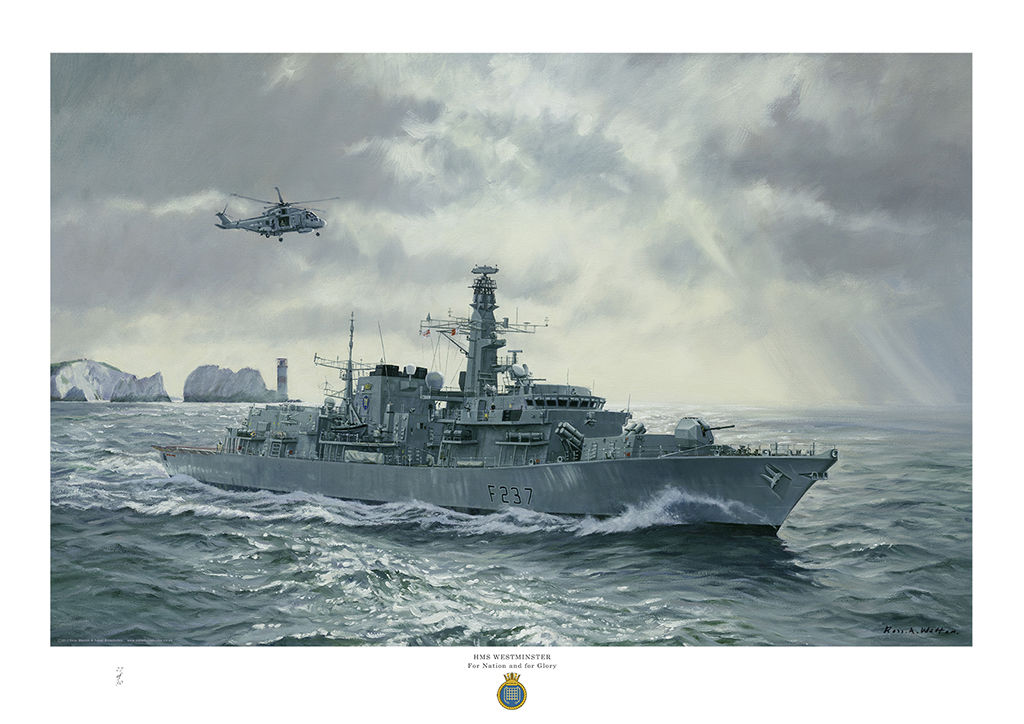 HMS Westminster at sea off the Needles IOW sun rays burst through the clouds and light sparkles on the water.