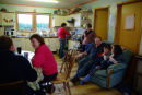 The family relaxing at breakfast after the early milking