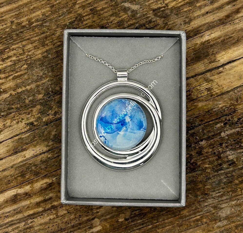 blue double circle in box