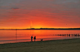 Walkers at dawn, Portobello Beach