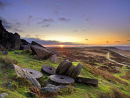 Sunrise over millstones on Stanage