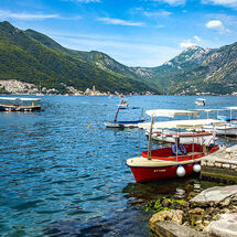 4147-Perast view St George Benedictine Monastery boats jetty mountains