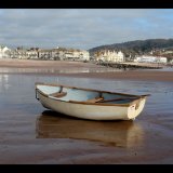 A Boat at low tide Sidmouth beach
