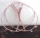 Figure in interlocking circles by Tadek Beutlich