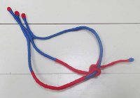 blue red wrapped esparto grass by Tadek Beutlich