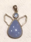 Peace angel pendant with blue angelite body and faceted blue topaz head