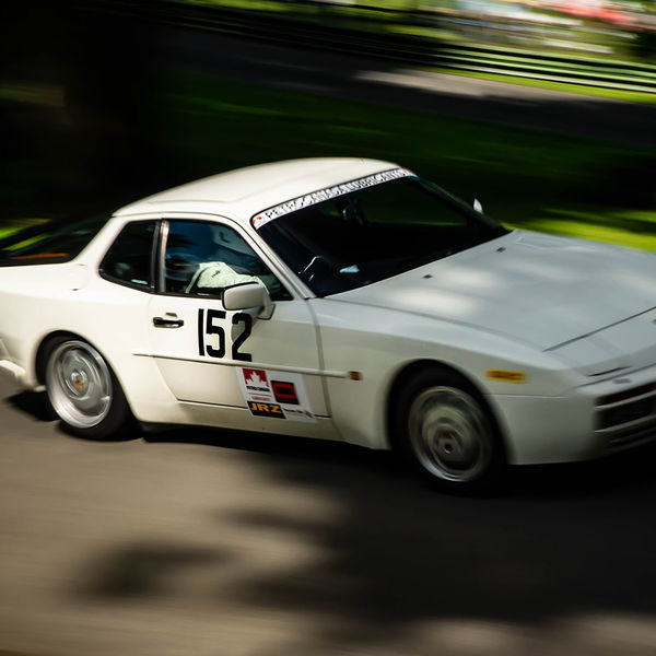 Porsche at Prescott 2019, #47 white porsche 944 at speed during the porsche at prescott hill climb event