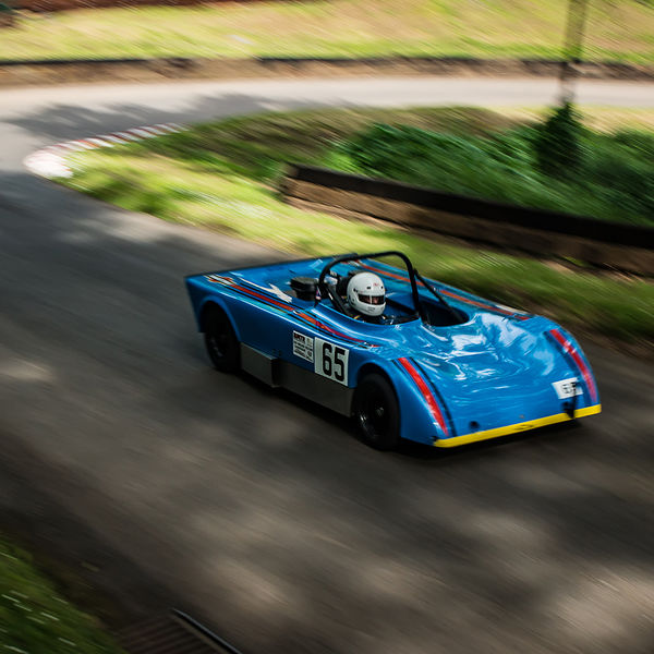 Best of British 2019, Shelsley Walsh, #07 blue classic single seat racing car sprinting up shelsley walsh hill climb at speed