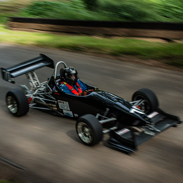 Best of British 2019, Shelsley Walsh, #09 black single seat racing car with motion blur on shelsley walsh hill climb at speed